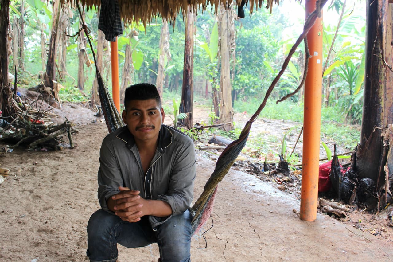 Mario Diaz Hernandez sits in a hammock outside his house in Chiquimula, Guatemala.
