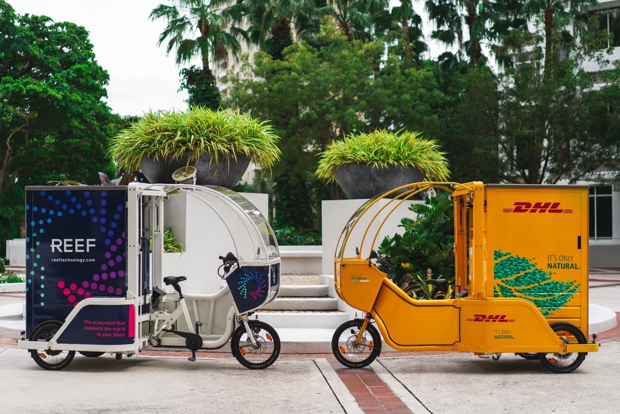 REEF Technology began by booking parking for Miami Heat basketball games, has since bought up under-utilized parking lots across the country and now employees 10,000 people in the United States, including 3,000 alone in greater Miami. The spaces are being converted into neighborhood logistics hubs for food kitchens and other goods, using electric bike carts. A pilot scheme uses robots to make deliveries. “Covid has proven you can support a remote work force and be successful,” says REEF co-founder Philippe Saint-Juste. “People want to live in a livable city and Miami is a model of what that can be,” he added.