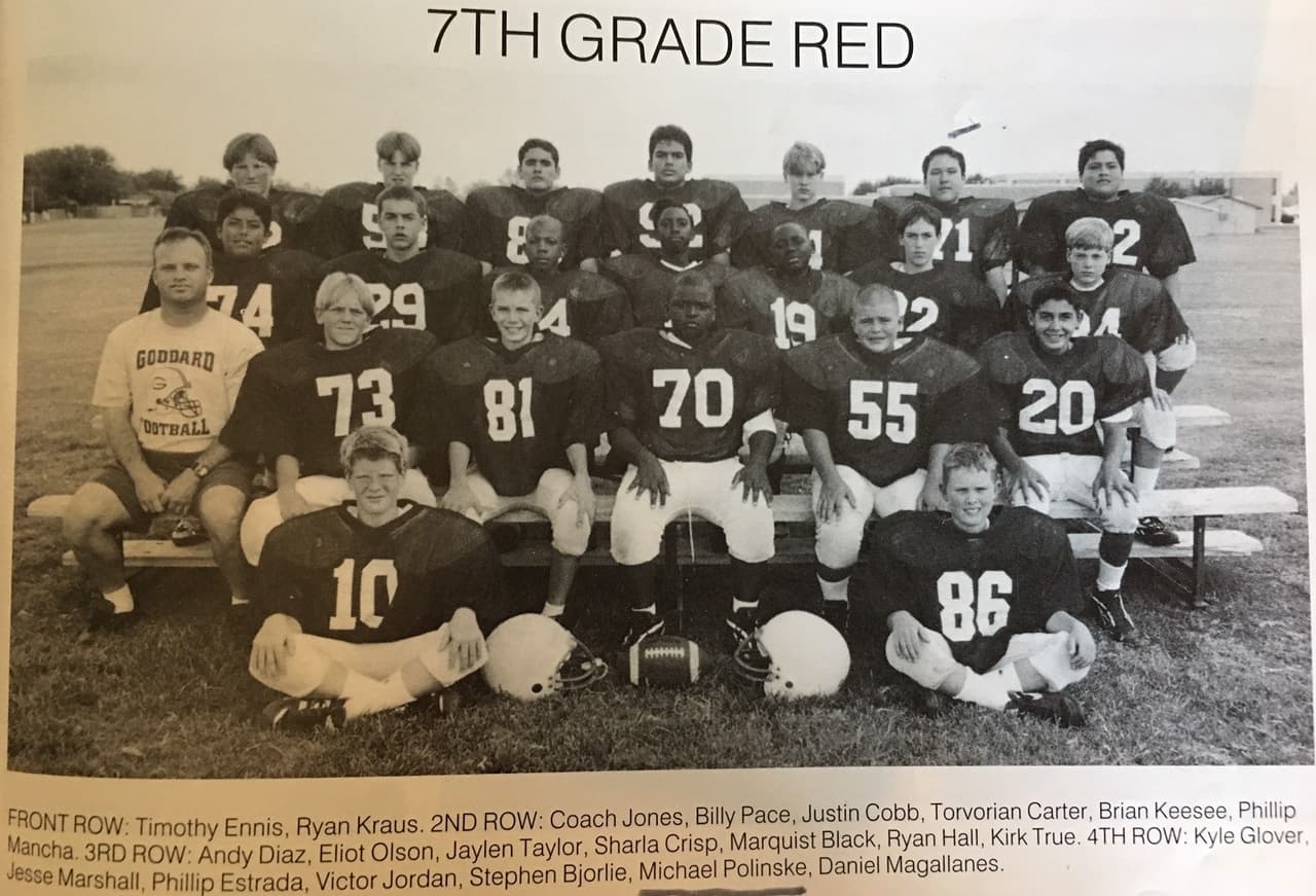Michael played with the football team at Goddard Junior High. "I played in every position, whatever, I practically never left the field," said Michael, who is now 33. (Seen here in the back row, second from the right)