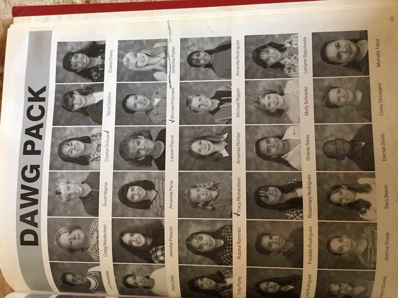 A class year book shows Michael in the second row, second from the right.