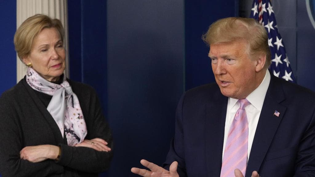 President Donald Trump, flanked by Dr. Deborah Birx, a member of the White House coronavirus crisis team. April 10, 2020.