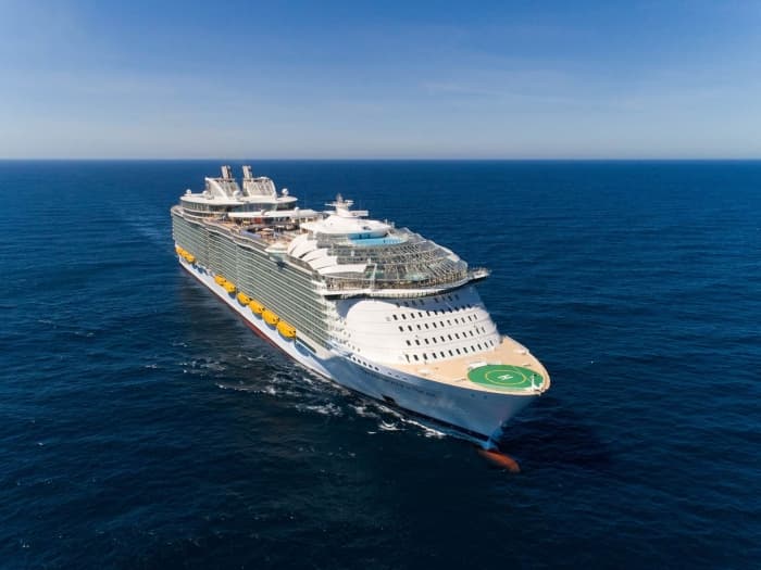 Royal Caribbean's Symphony of the Seas, the largest cruise ship in the world. One crew member was medically evacuated from Symphony of the Seas last month for observation and treatment of respiratory issues. The ship is currently sitting idle in the port of Miami.