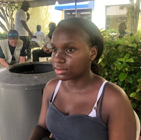 Lashanda McKinney, 19, lives in Nassau. She moved to the island to attend university but her whole family is in Grand Bahama and Abaco, areas razed by #Dorian. She was sitting at Odyssey Aviation waiting for news from her family. "I keep the faith," she says.