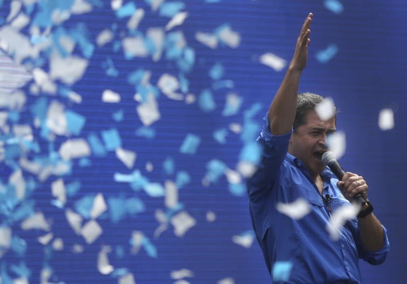 Honduran President Juan Orlando Hernandez speaks during his closing campaign rally, in Tegucigalpa, Honduras. Nov. 19, 2017 file photo, AP Photo/Rodrigo Abd
