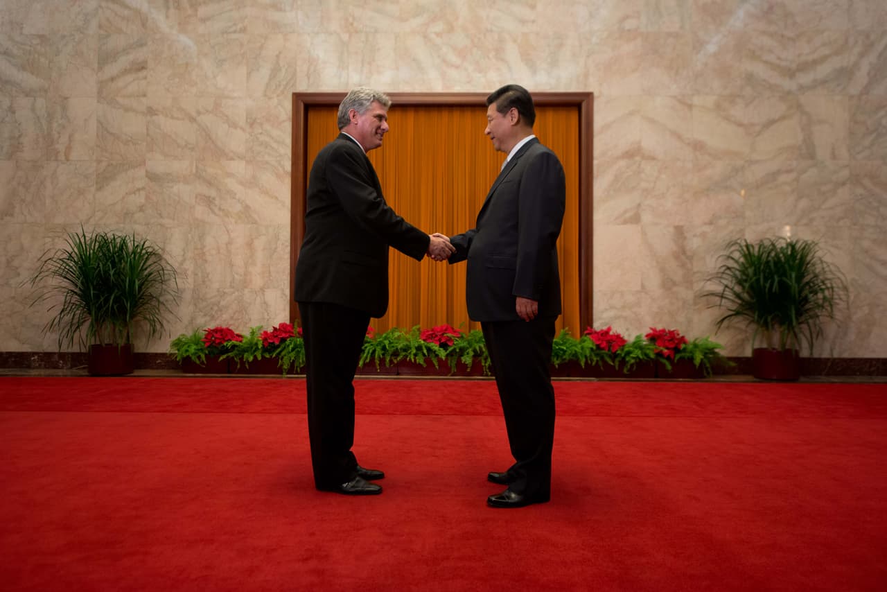 Díaz-Canel is considered by many to be an agent of possible change in Cuba. However, he has made his loyalty clear to the Castro's revolutionary ideas. In this photograph, on a 2013 state visit to China, where he met President Xi Jinping.