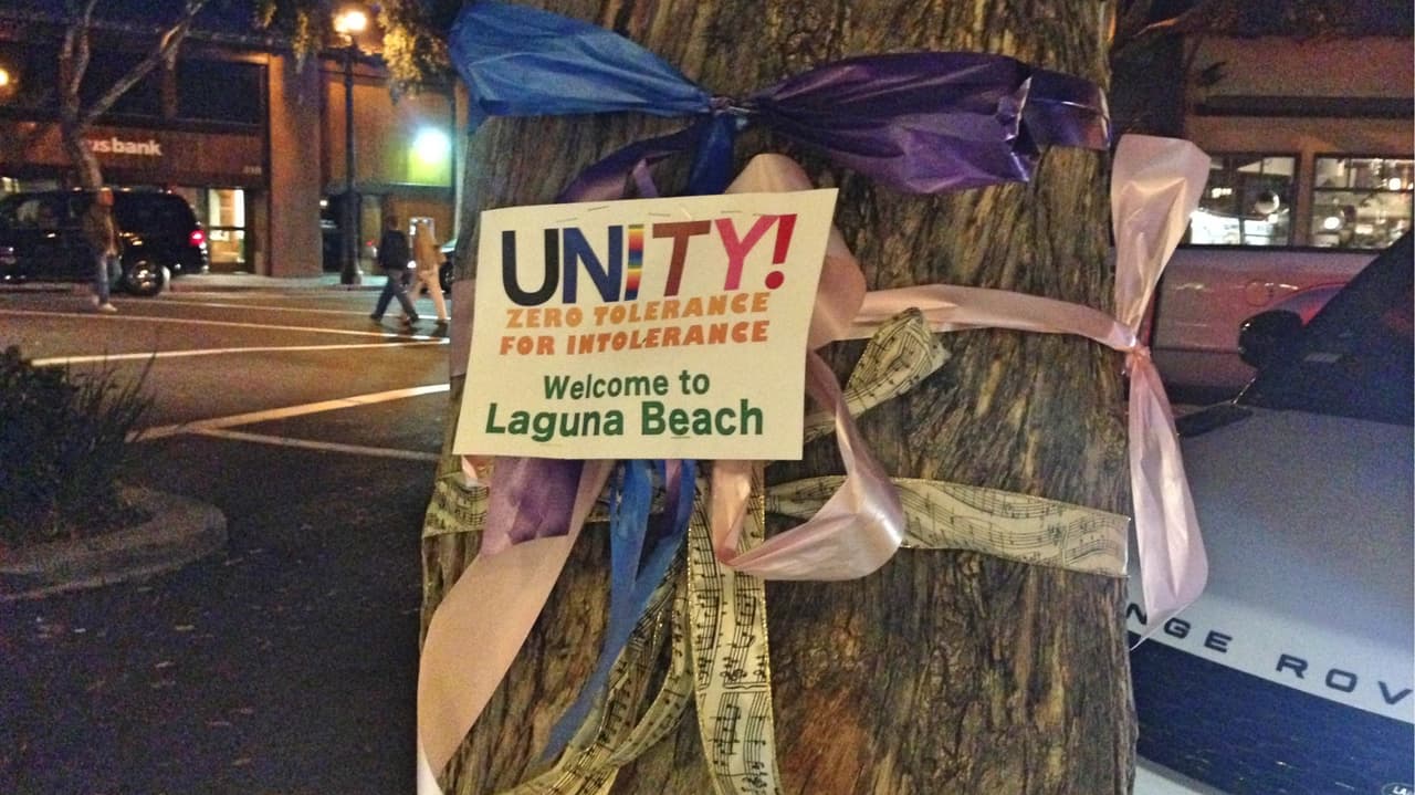 Signs saying "Zero tolerance for intolerance,' with ribbons welcomed people to Laguna Beach. Aug 20 2017.