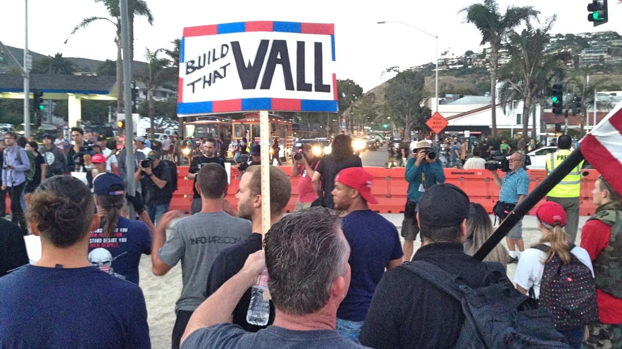 The 'America First!' protest included support for building Trump's border wall.