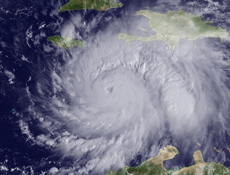 A satellite image of Hurricane Matthew sitting over the central Caribbean, located about 220 miles southeast of Kingston, Jamaica, at 9:15 am EDT on October 3, 2016.