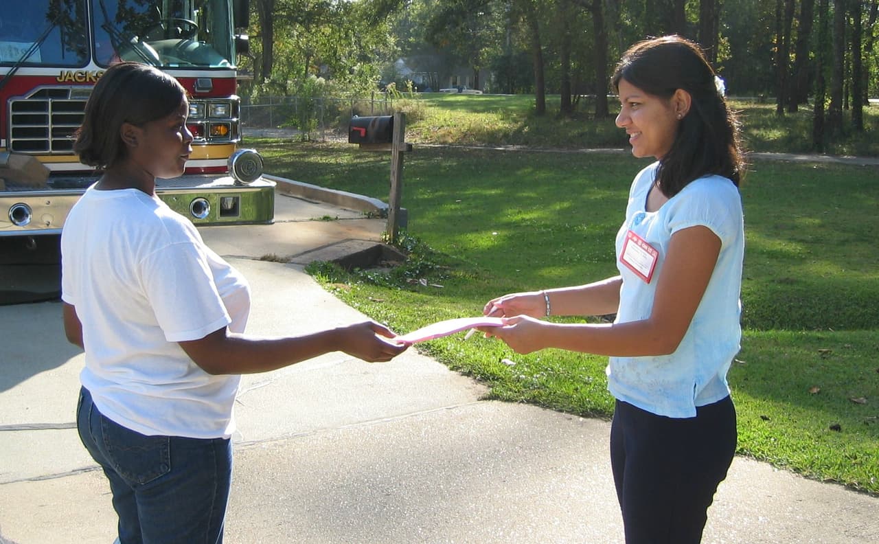 An Edison Research exit poll worker collecting voter data for national media