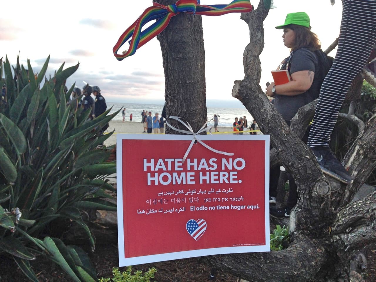 A sign on Laguna Beach reads: "Hate had no home here" in several languages. Aug 20 2017