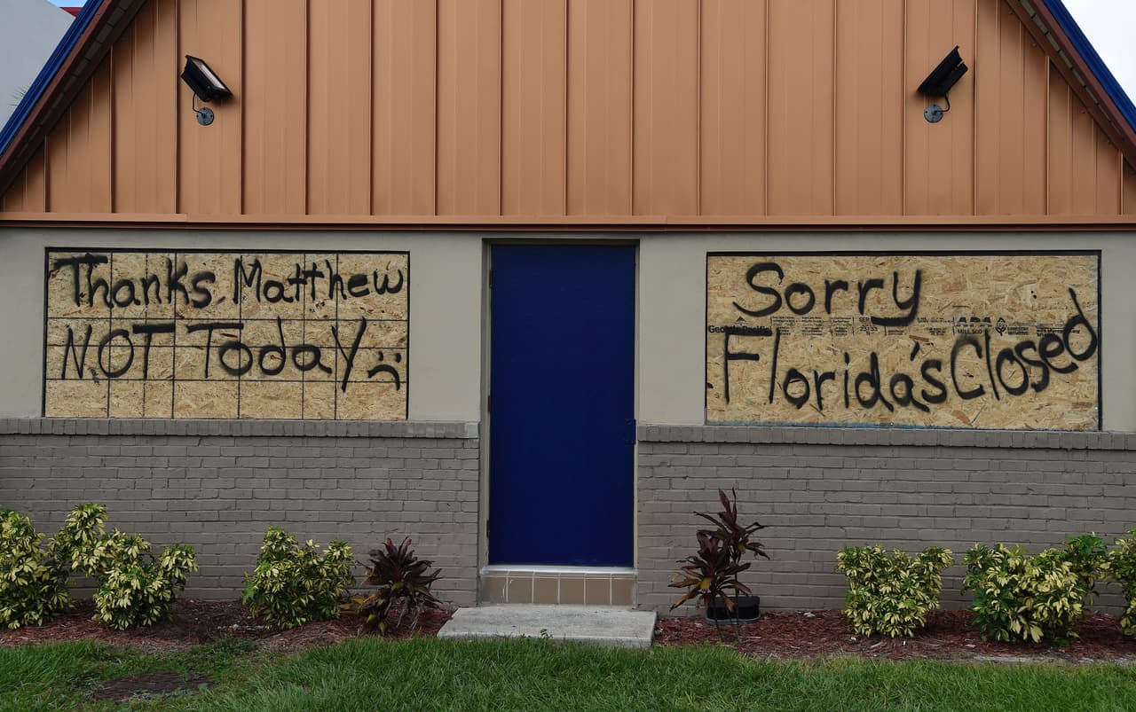Florida residents boarded up on the eve of Matthew's arrival.